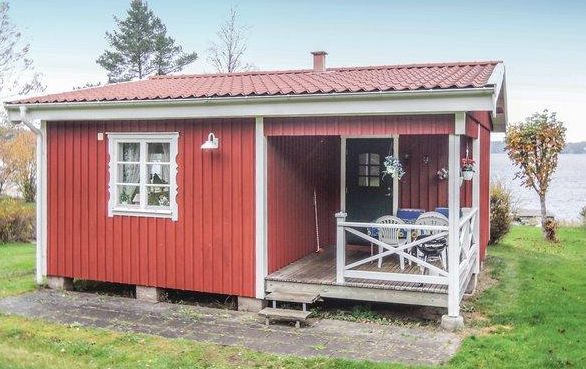 Ferienhaus in Schweden mit Boot am See